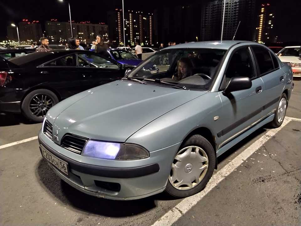 Mitsubishi carisma: как меньше есть и дольше бегать: mitsubishi carisma 1,8 gdi - автомобильный справочник